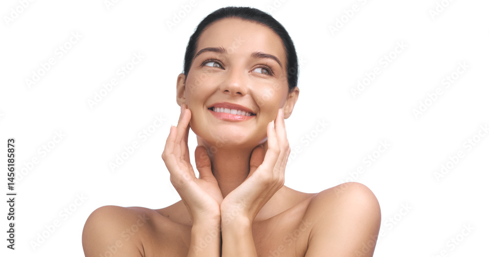 Young Caucasian woman with flawless, glowing skin smiling joyfully while touching her face. Ideal for skincare, beauty, and wellness concepts in advertisements and promotions.