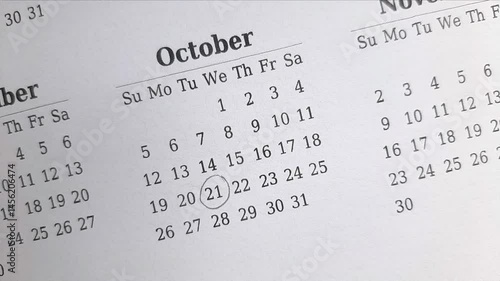 marking 21 October date on the calendar	

