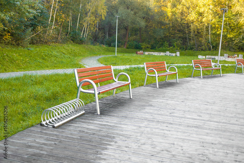 Obraz na płótnie Tranquil Park Scene at Sunrise with Lush Greenery and Peaceful Pathway. High quality photo w salonie