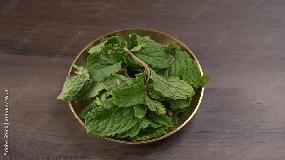 Ginger root vegetables and fresh mint leaves Concept health diet.
Ginger root vegetables and fresh mint leaves Concept health diet.