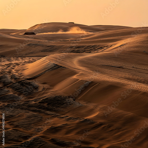 Desert dunes, sculpted by wind, brown and gold. Vast and timeless.