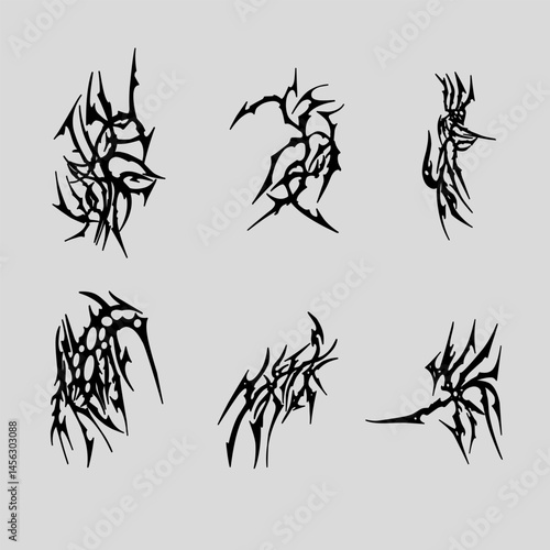 Set of abstract black tribal tattoo shapes with sharp, jagged lines and edgy artistic flair