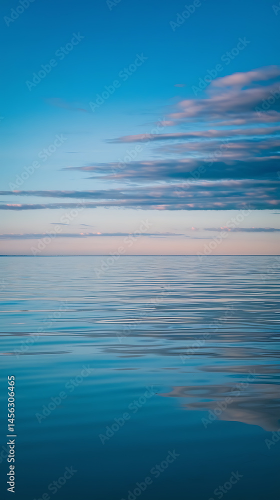 Obraz premium Calm water, serene sky, peaceful scene.