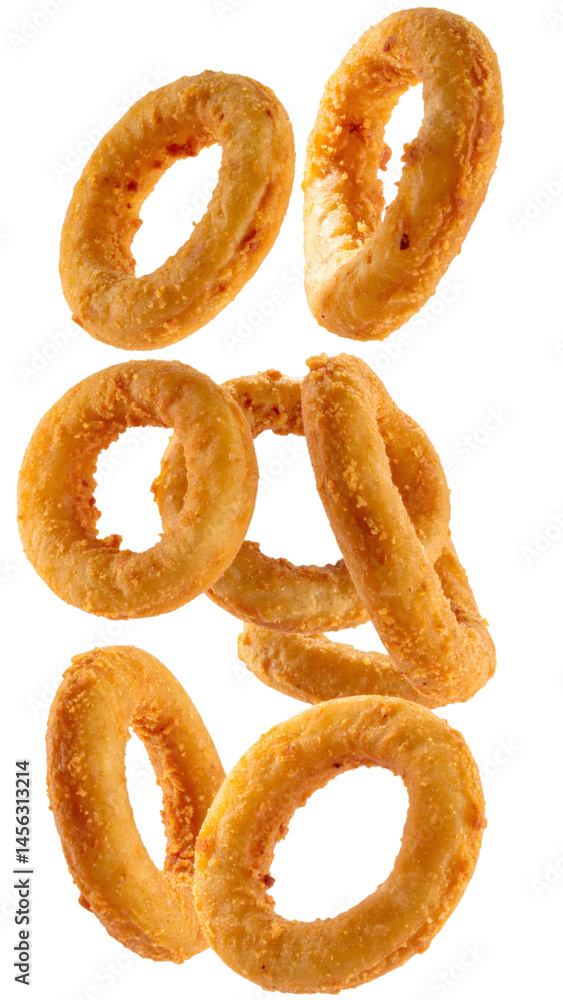 Fototapeta premium Crispy onion rings falling on transparent background