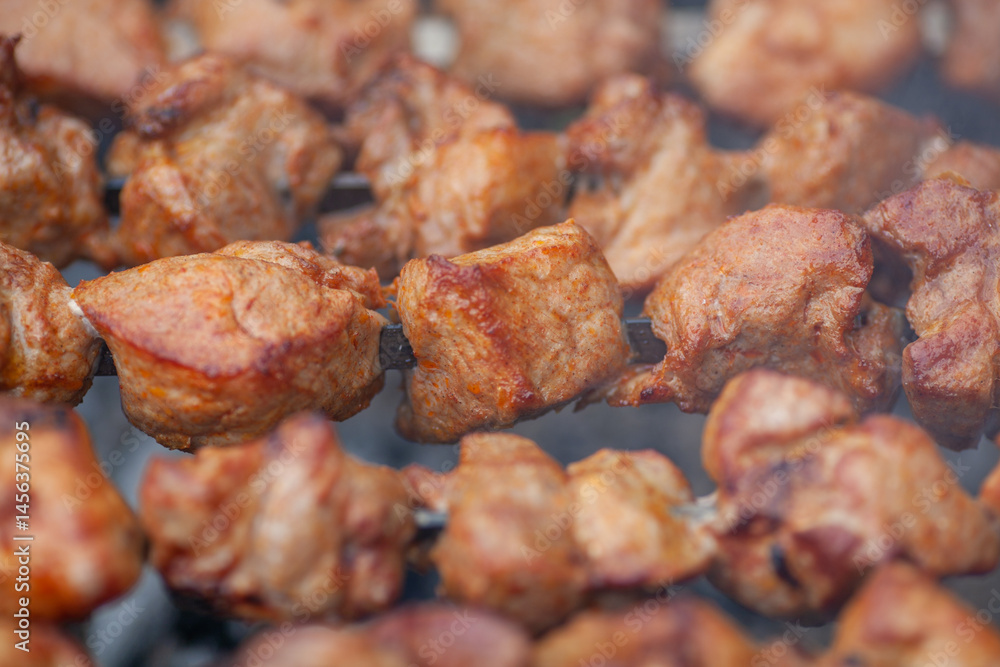 The meat is grilled on barbecue skewers The meat is grilled on barbecue skewers