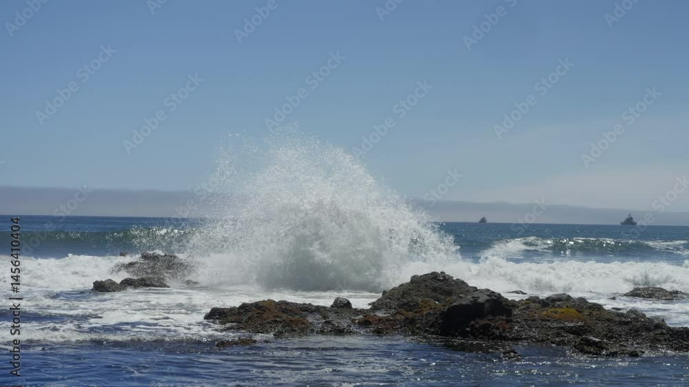 The ocean shore is covered with sharp rocks The ocean shore is covered with sharp rocks