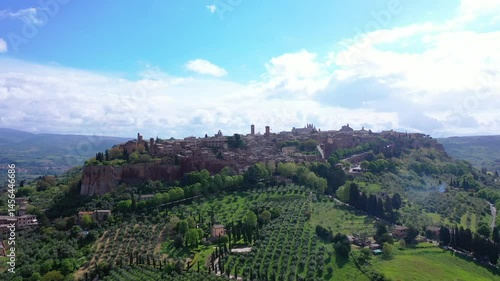 Orvieto, Umbria, Italy: Panoramic view of town nestled in hills.