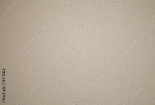 Bild auf Leinwand Textured beige plaster wall with swollen and cracked areas