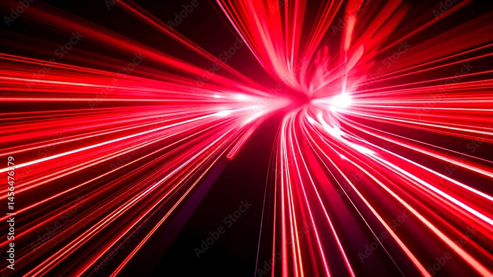 Fototapeta premium A dynamic burst of red and white light streaks radiating from a central point, creating a sense of speed and motion.