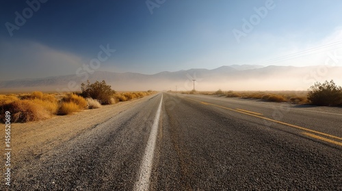 The Toiyabe Mountains in Nevada are illuminated at sunrise along America's Loneliest Road, which is US