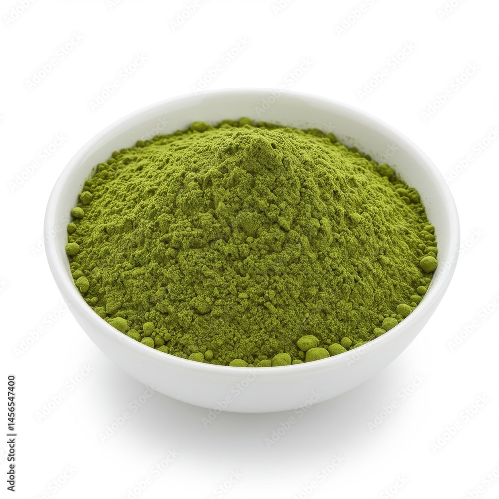 A close up of a white bowl filled with green matcha powder on a white background studio shot A close up of a white bowl filled with green matcha powder on a white background studio shot