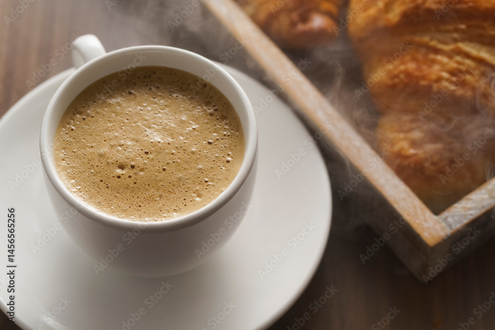 Breakfast with cappuccino and delicious croissants, rustic plank background, french coffee shop concept Breakfast with cappuccino and delicious croissants, rustic plank background, french coffee shop concept