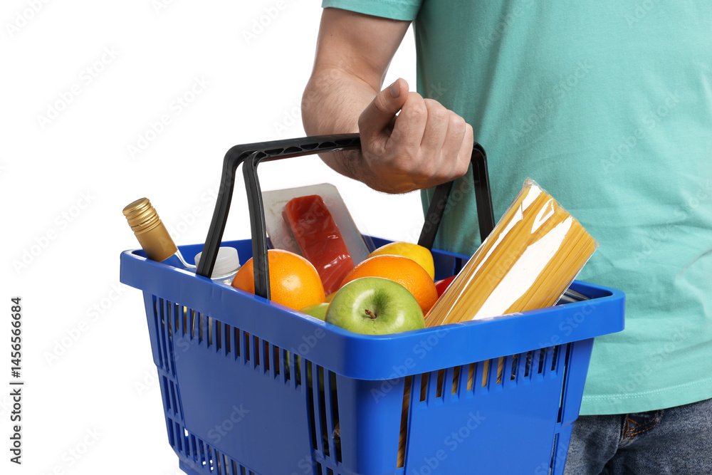 Fototapeta premium Man with shopping basket full of products on white background, closeup