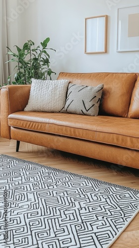 Stylish Living Room with Brown Leather Sofa and Patterned Rug for Home Decor Ideas