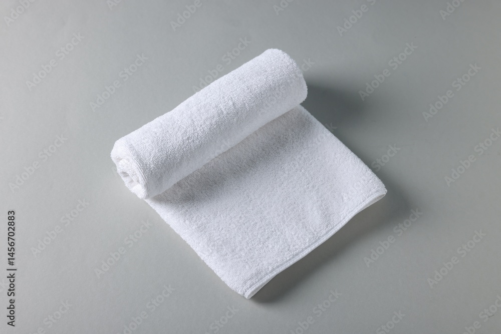 Fototapeta premium Clean towel on gray background, above view