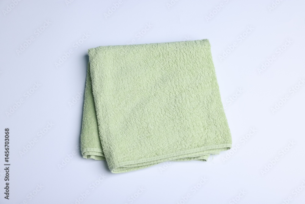 Clean towel on white background, above view Clean towel on white background, above view