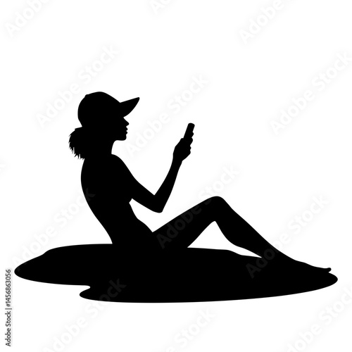 Woman relaxing in silhouette on beach, digital detox concept