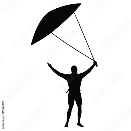 Silhouette of a Person Kite Surfing, Windsurfing, or Kitesurfing