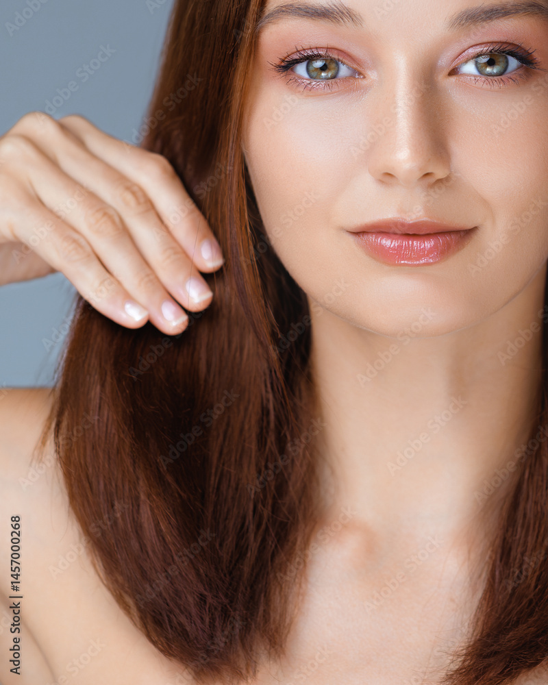 Closeup of a Caucasian woman with clear skin, glossy lips, and straight shiny brown hair, ideal for promoting skincare, haircare, lip products, or wellness and beauty-themed campaigns.