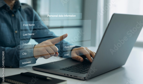 Quadro su tela Business person filling out a form with personal data online
