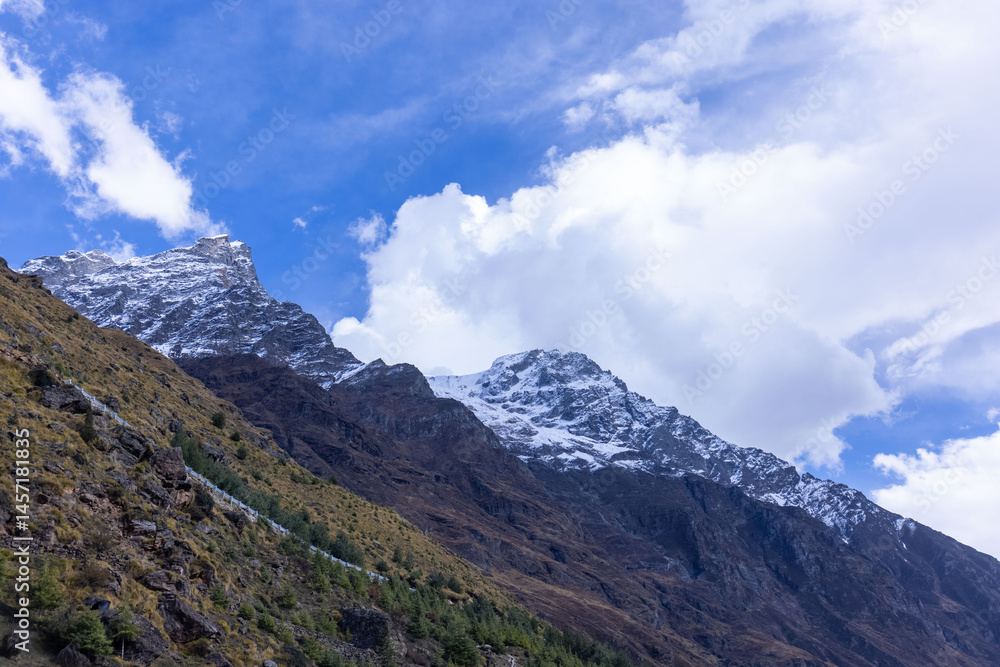 Obraz premium Landscape of Himalaya, Panoramic view of Himalayan mountain covered with snow. Himalaya mountain landscape in winter at Kedarnath valley.