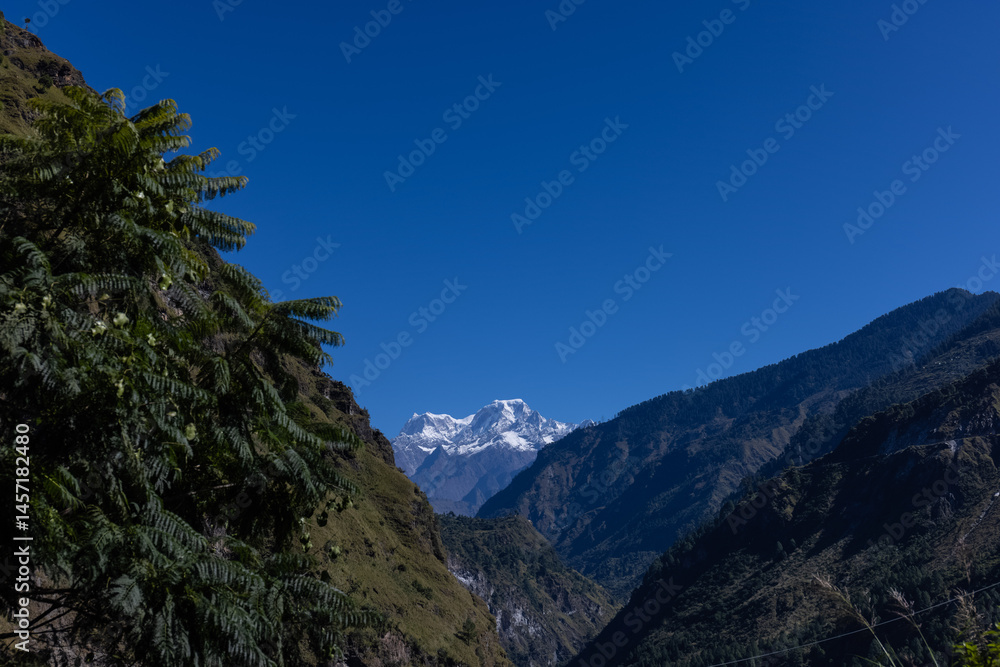 Obraz premium Landscape of Himalaya, Panoramic view of Himalayan mountain covered with snow. Himalaya mountain landscape in winter at Kedarnath valley.