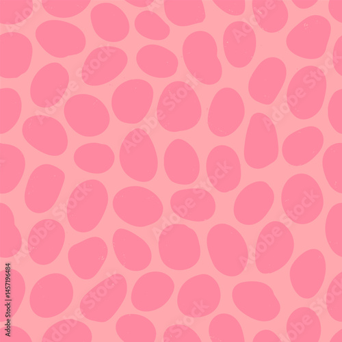 Irregular spotted seamless pattern with hand drawn pencil textured organic shapes. Seamless background with sketchy scribble spots in pink and peach colors. Abstract vector seamless wallpaper.