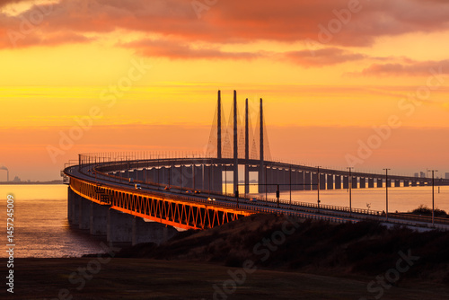 Wallpaper Mural Oresund Bridge between Sweden and Denmark at sunset over the sea. Torontodigital.ca