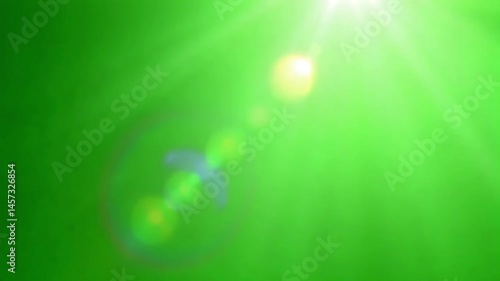 Green screen background with bright sunlight rays ideal for compositing and visual effects projects