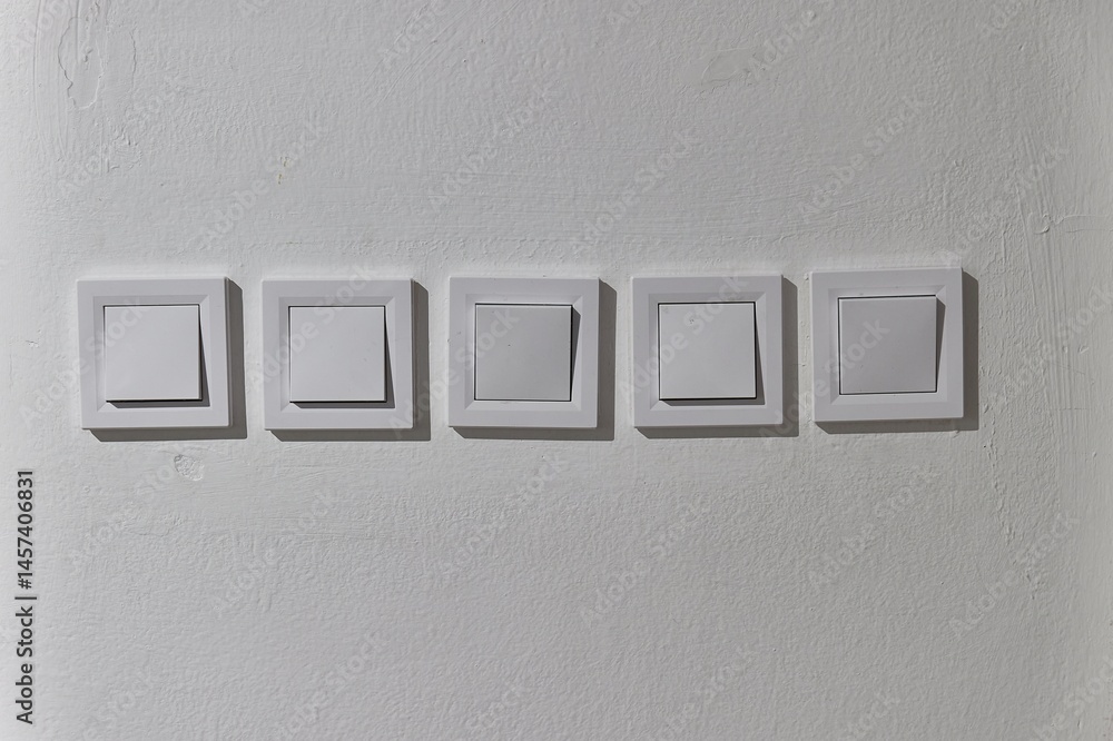 Many light switches of a big room