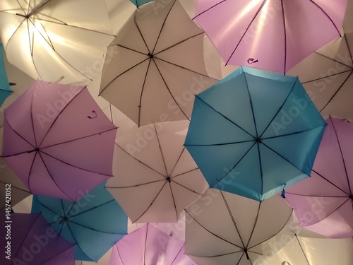 Pastel Umbrellas Hanging Overhead as Creative Urban Art Installation