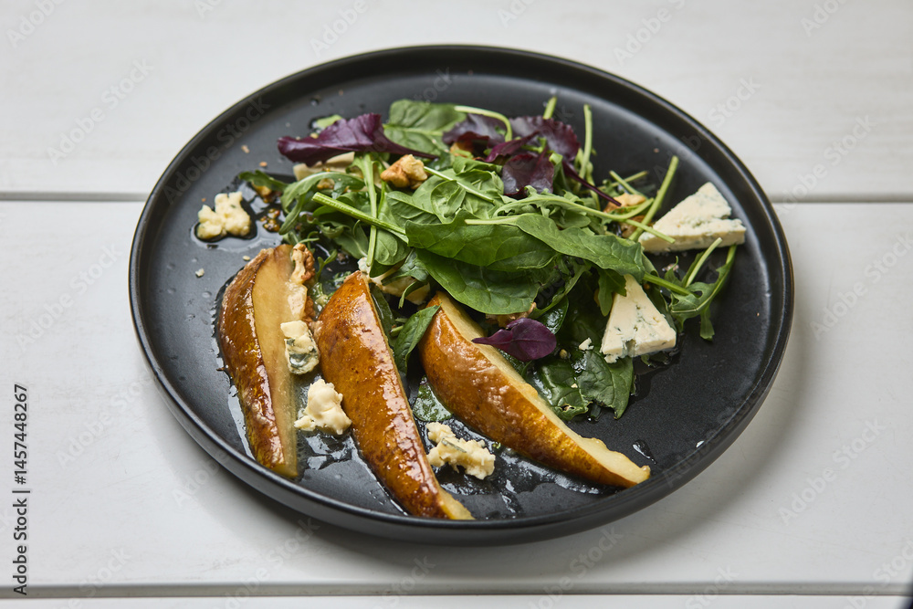 Gourmet pear salad with blue cheese and greens