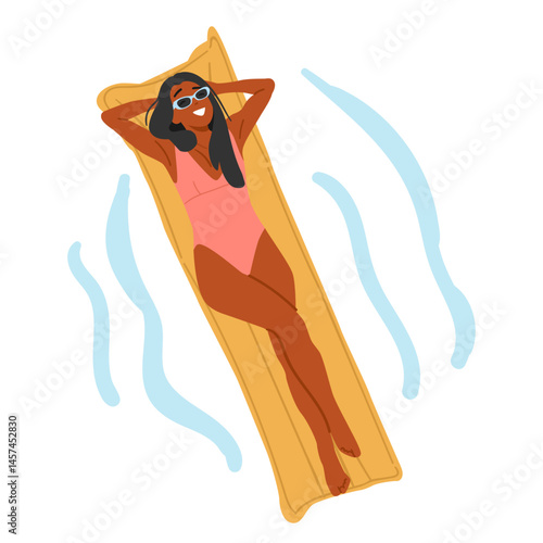 Young attractive woman wearing swimsuit sunbathing while floating on inflatable mattress in sea wave