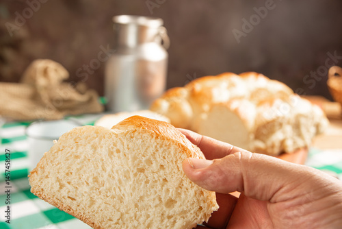 Homemade bread, a beautiful breakfast table with delicious homemade bread on a rustic wooden surface with a tablecloth, selective focus.