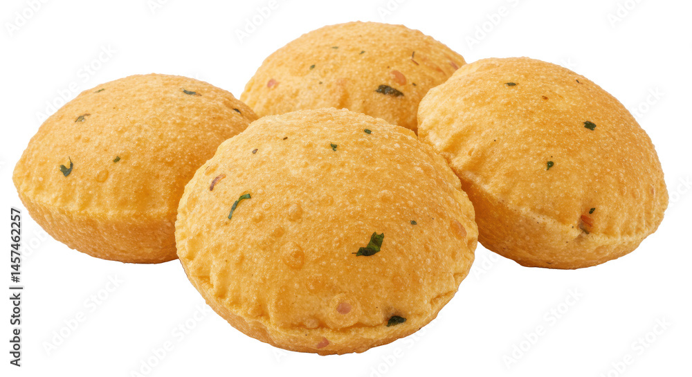 A close up shot showcasing four round yellow pastries with dark specks arranged on a neutral background surface A close up shot showcasing four round yellow pastries with dark specks arranged on a neutral background surface