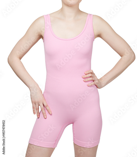 Obraz na płótnie Studio shot of a woman's lower body from the front, showcasing grey ribbed high-waisted shorts. The fabric has a distinct vertical ribbed texture. Isolated on white background. w salonie