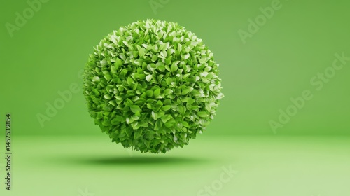 Green sphere with leaves on monochromatic background