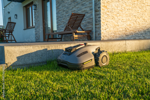 Obraz na płótnie Perfectly cut lawn by robotic lawn mower w salonie