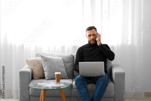 Man working remotely from h...