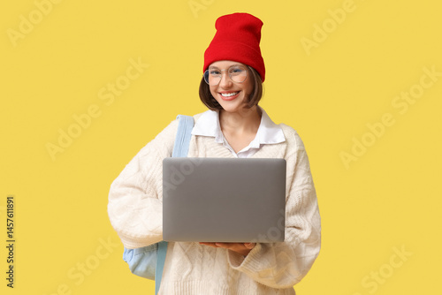 Smiling young woman student...