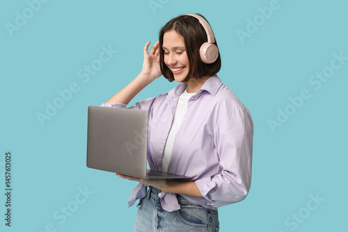 Smiling young woman wearing...