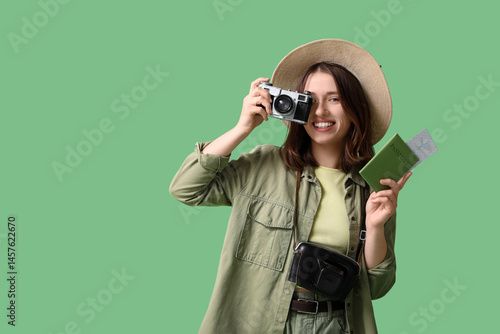 Female traveler with photo ...