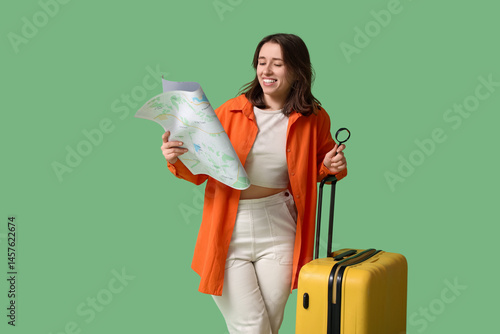 Female traveler with map an...