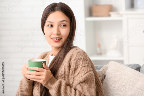 Beautiful young Asian woman...