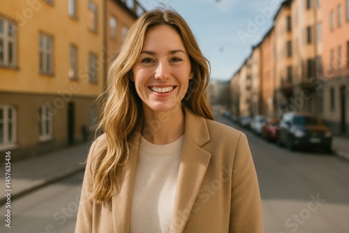Smiling woman in urban street.