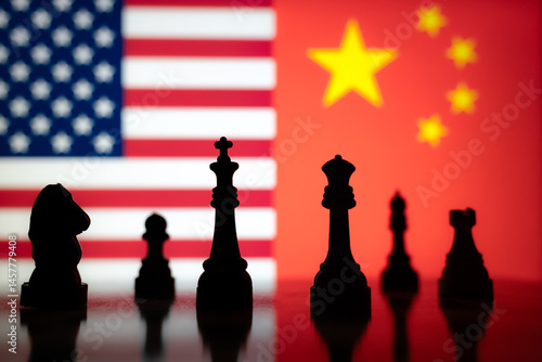 Εκτύπωση καμβά Chess pieces silhouetted in front of US and China flags , symbolizing economic tension, tariffs, and power rivalry between the United States and China