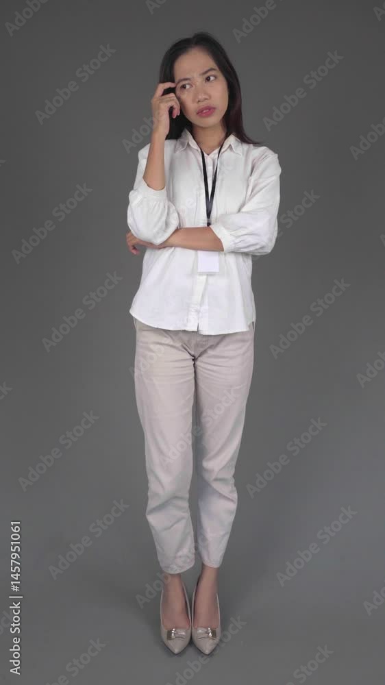 Full Body Portrait of Young Businesswoman Pointing Thinking Full Body Portrait of Young Businesswoman Pointing Thinking