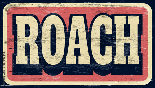 Aged retro roach sign on wood