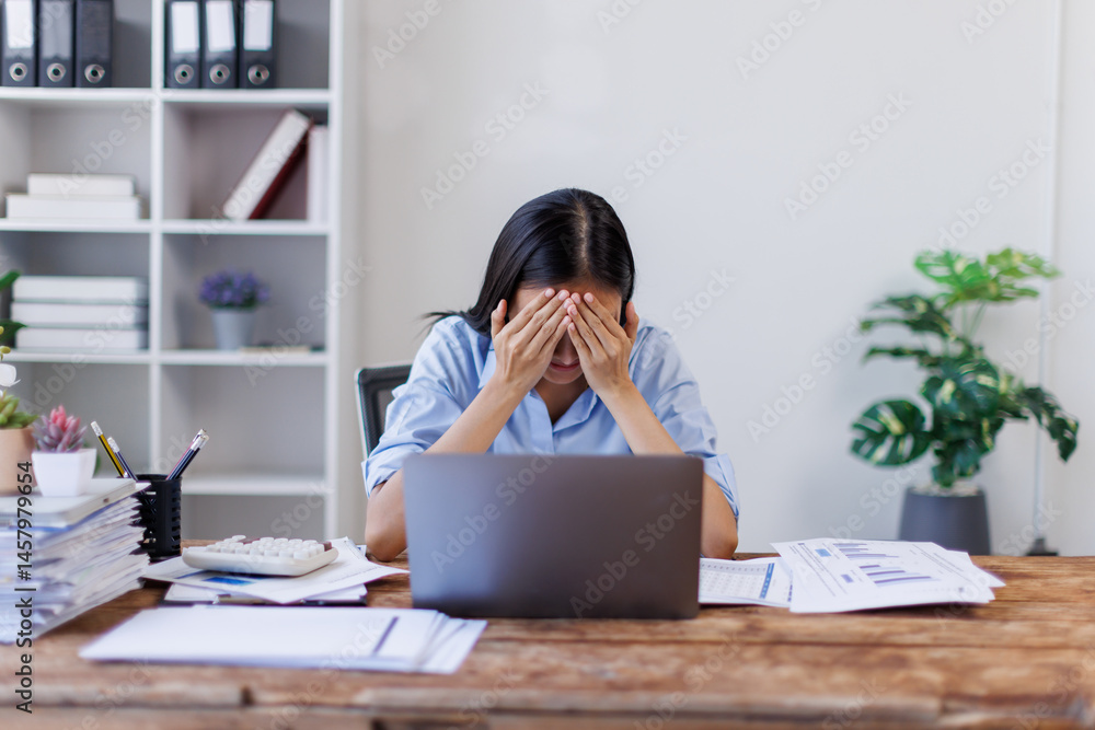 Stress, anxiety or headache of business asian woman working on laptop online report, proposal or copywriting at workplace office desk Burnout, frustrated corporate worker with problem, fail or error. Stress, anxiety or headache of business asian woman working on laptop online report, proposal or copywriting at workplace office desk Burnout, frustrated corporate worker with problem, fail or error.