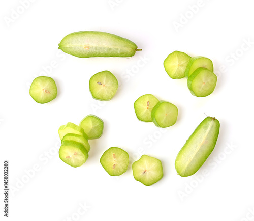 Wallpaper Mural belimbing wuluh. Averrhoa bilimbi fruits or Belimbing slice , cut in half on a white background Torontodigital.ca